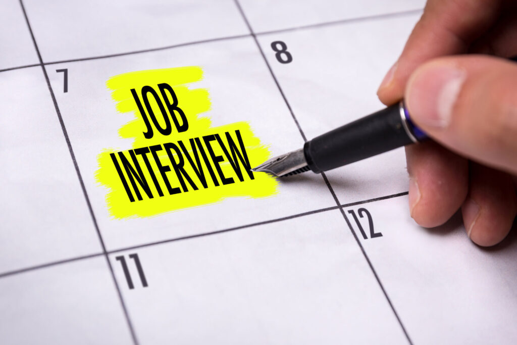 A schedule for a job interview marked on a calendar