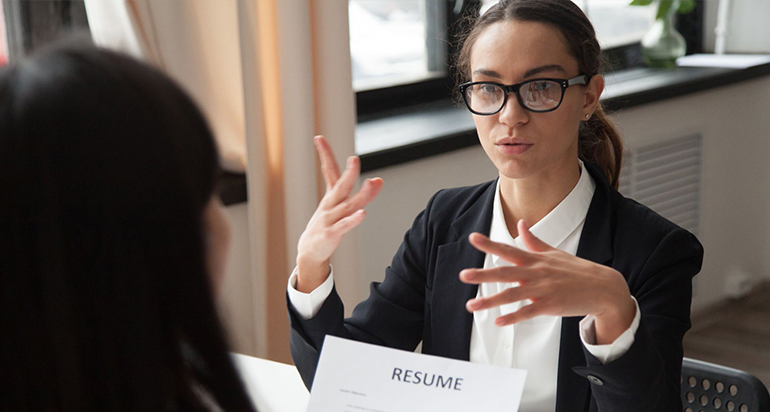 A recruiter interviewing a job applicant