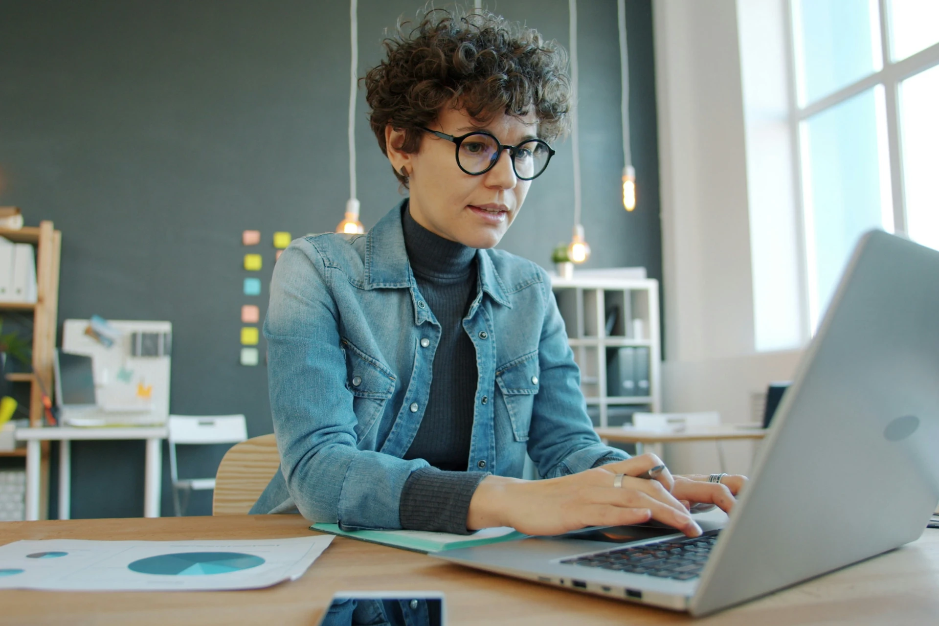 A remote employee working from their laptop at home