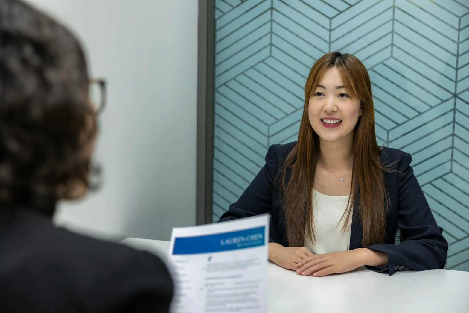 A female job applicant in an interview